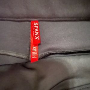 Spanx nylon pants. No sign of wear.  Back pockets. Crop leg.
